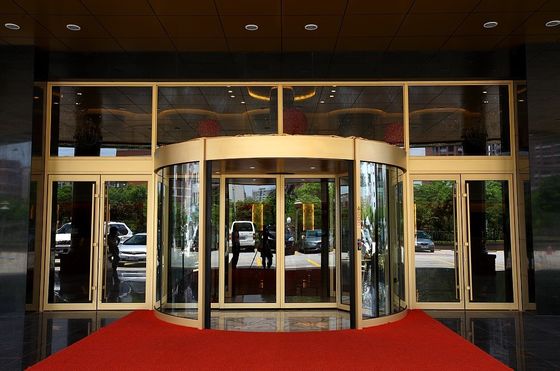 Cina Luxurious building entrance Automatic curved sliding door Of Aluminium / steel frame pabrik